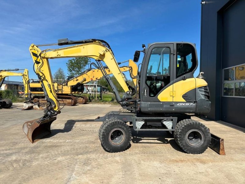 Mobilbagger of the type Doosan DX 57 W-5, Gebrauchtmaschine in Wommels (Picture 1)