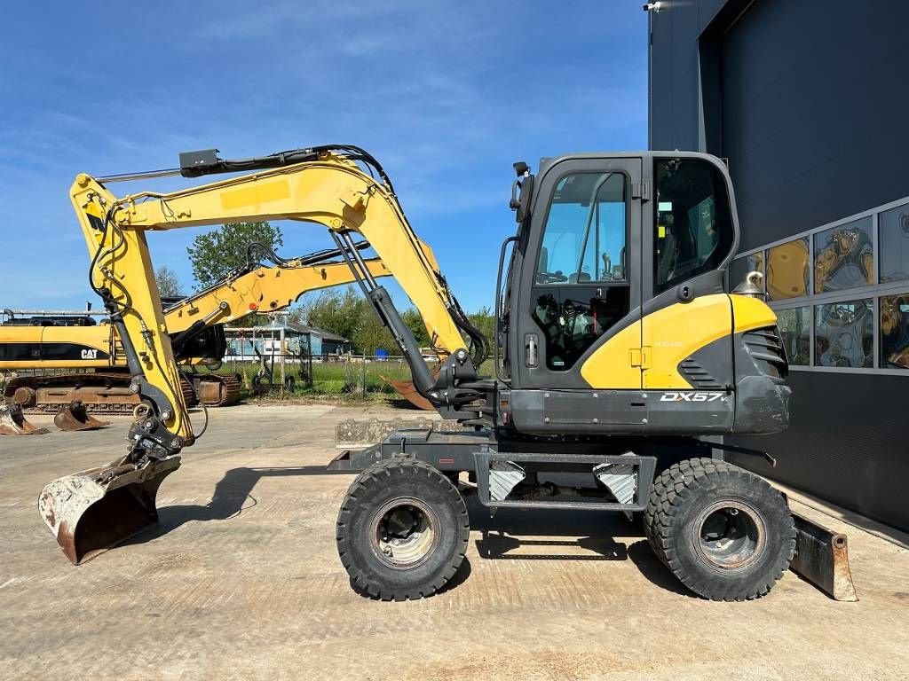 Mobilbagger del tipo Doosan DX 57 W-5, Gebrauchtmaschine en Wommels (Imagen 1)