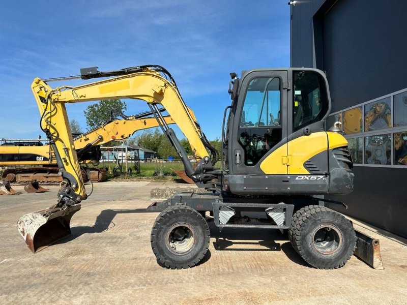 Mobilbagger des Typs Doosan DX 57 W-5, Gebrauchtmaschine in Wommels (Bild 1)