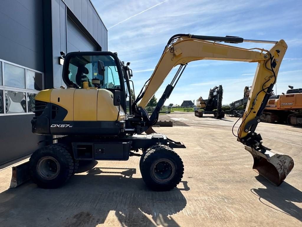 Mobilbagger del tipo Doosan DX 57 W-5, Gebrauchtmaschine en Wommels (Imagen 4)