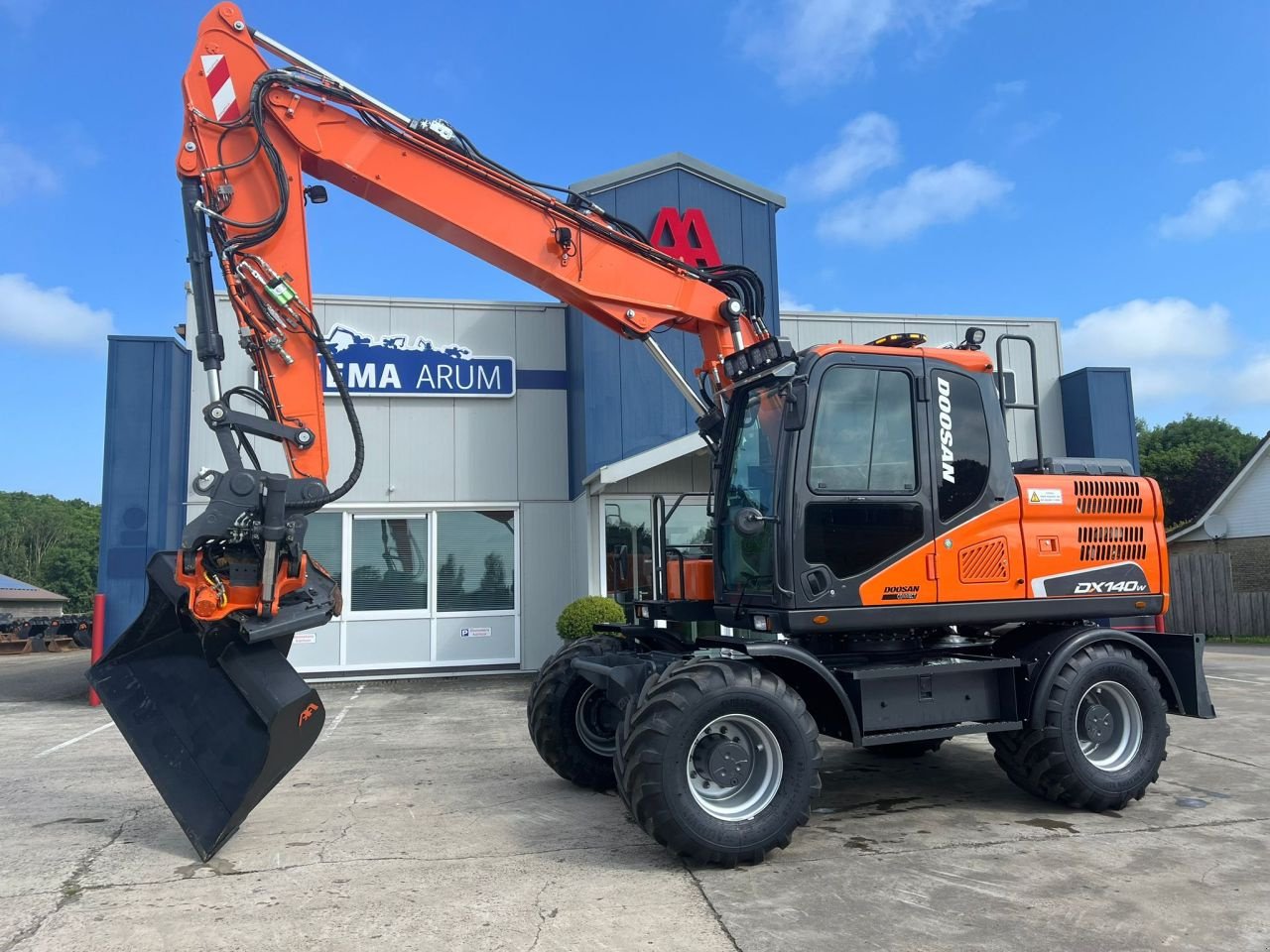 Mobilbagger tipa Doosan DX140W-5, Neumaschine u Arum (Slika 1)