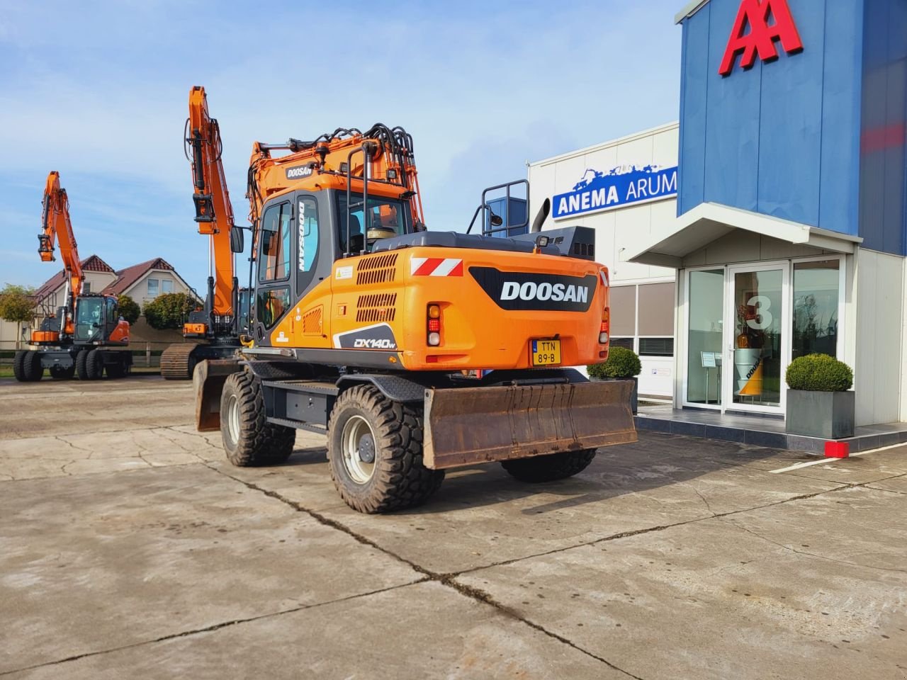 Mobilbagger des Typs Doosan DX140W-5, Gebrauchtmaschine in Arum (Bild 2)