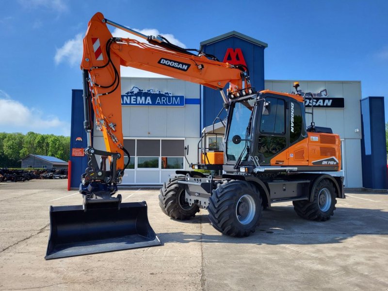 Mobilbagger del tipo Doosan DX140W-7, Gebrauchtmaschine In Arum (Immagine 1)