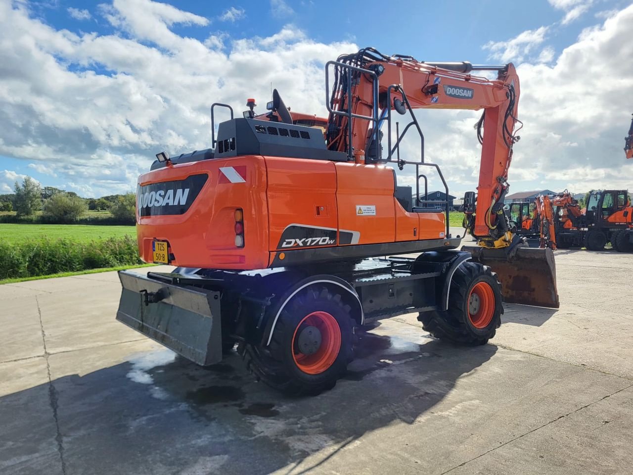 Mobilbagger del tipo Doosan DX170W-5, Gebrauchtmaschine In Arum (Immagine 3)