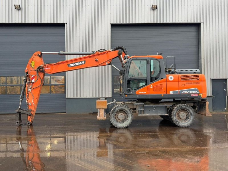 Mobilbagger del tipo Doosan DX190W-5, Gebrauchtmaschine In Velddriel (Immagine 1)