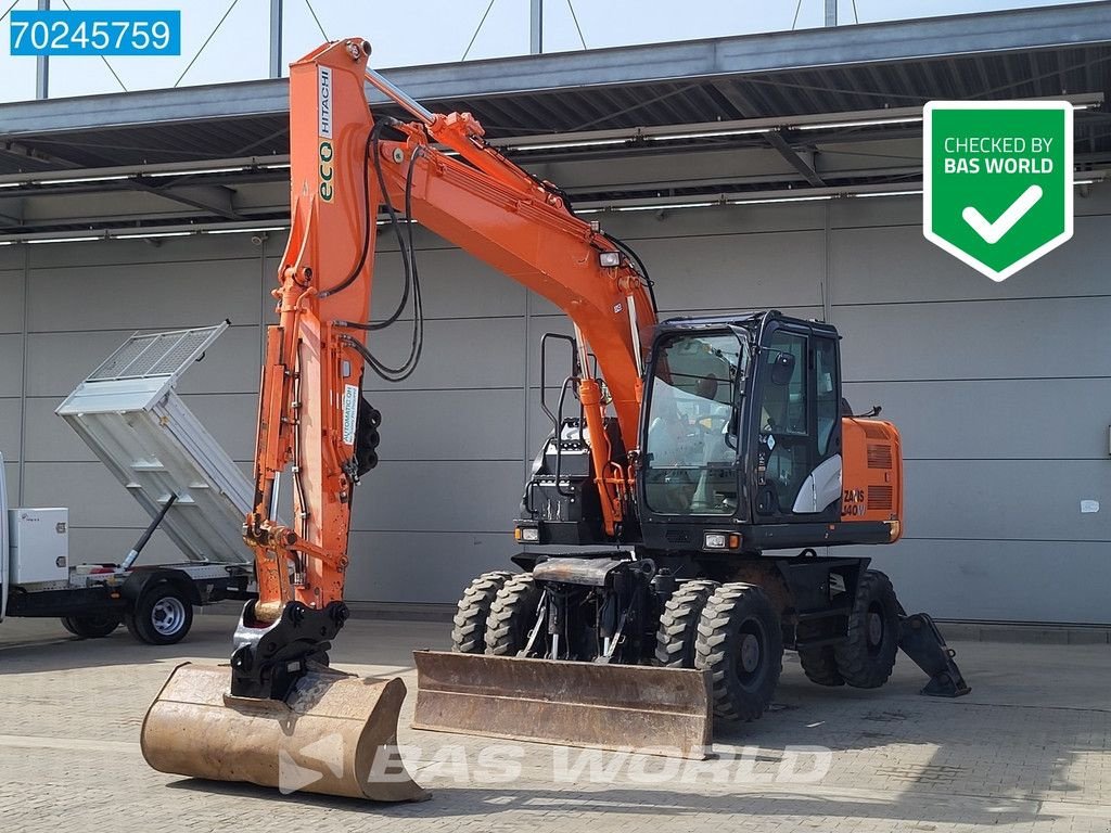 Mobilbagger of the type Hitachi ZX140 W -5B BLADE + OUTRIGGERS, Gebrauchtmaschine in Veghel (Picture 1)