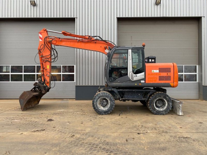 Mobilbagger du type Hitachi ZX140W-3, Gebrauchtmaschine en Velddriel (Photo 1)