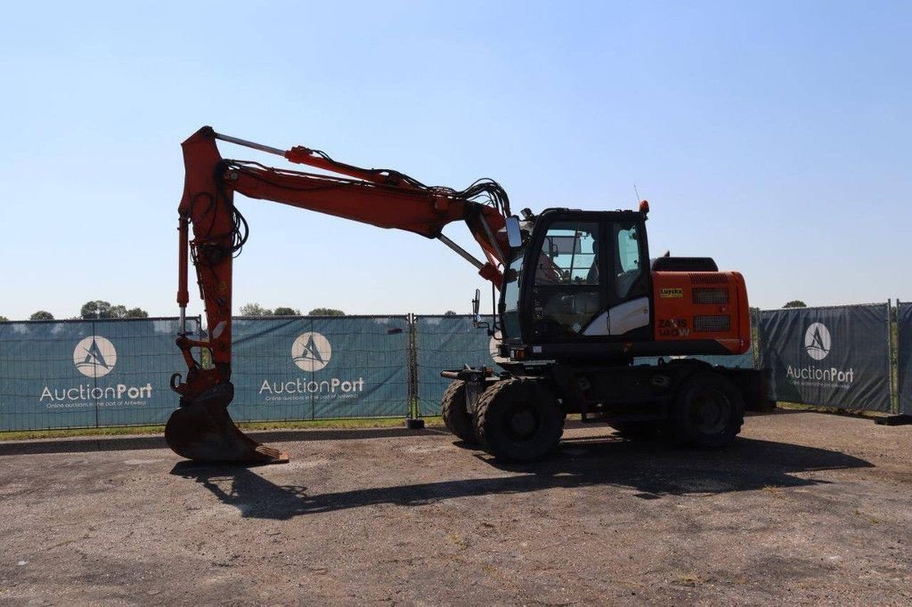 Mobilbagger du type Hitachi ZX140W-5B, Gebrauchtmaschine en Antwerpen (Photo 1)