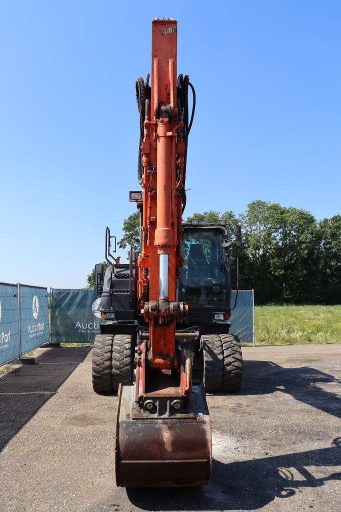 Mobilbagger du type Hitachi ZX140W-5B, Gebrauchtmaschine en Antwerpen (Photo 9)