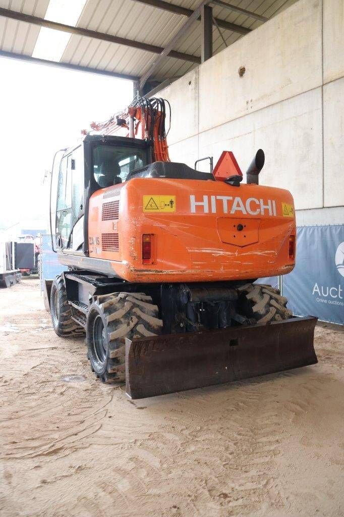 Mobilbagger du type Hitachi ZX140W-5B, Gebrauchtmaschine en Antwerpen (Photo 4)