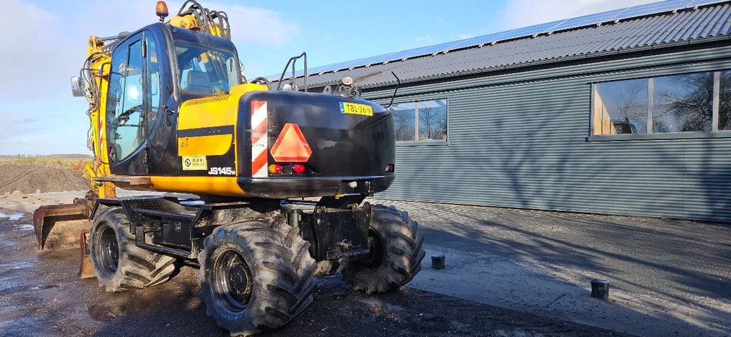 Mobilbagger tip JCB JS145 W, Gebrauchtmaschine in Scharsterbrug (Poză 4)