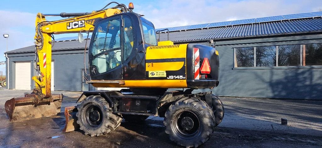 Mobilbagger des Typs JCB JS145 W, Gebrauchtmaschine in Scharsterbrug (Bild 5)