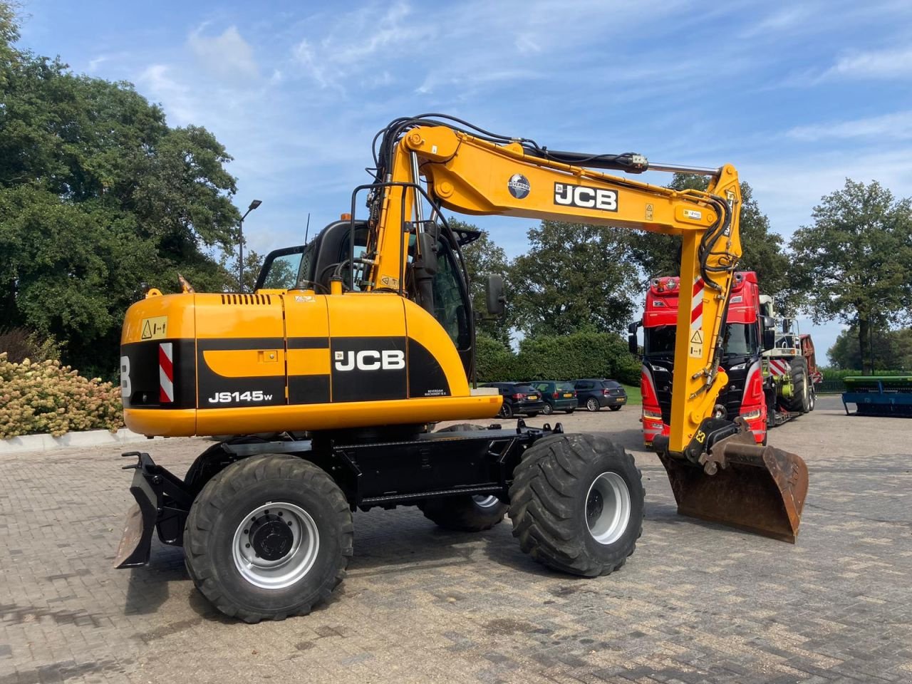 Mobilbagger del tipo JCB JS145W, Gebrauchtmaschine In Vriezenveen (Immagine 7)