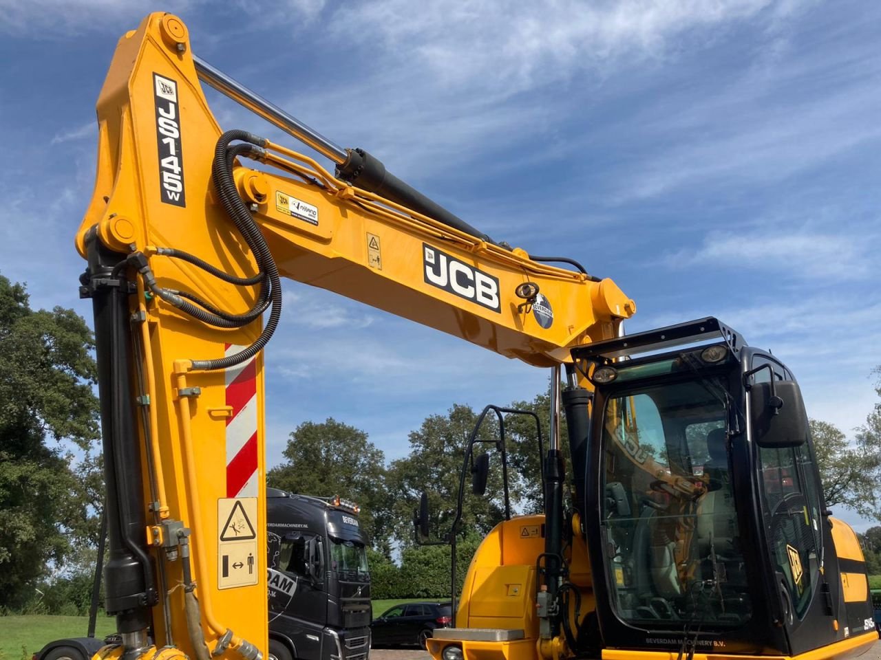 Mobilbagger del tipo JCB JS145W, Gebrauchtmaschine In Vriezenveen (Immagine 10)