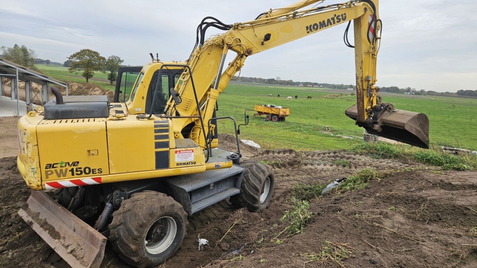 Mobilbagger typu Komatsu PW 150 es, Gebrauchtmaschine v Bergen op Zoom (Obrázek 4)