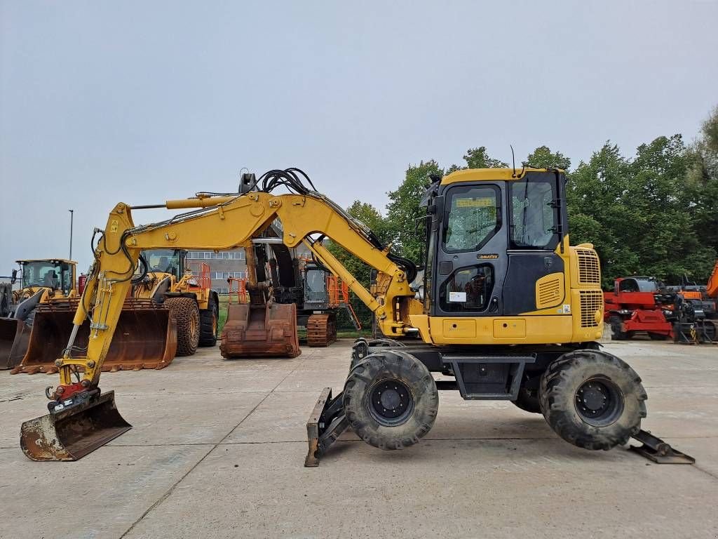 Mobilbagger du type Komatsu PW98-MR10 (5 Buckets + Forks), Gebrauchtmaschine en Stabroek (Photo 1)