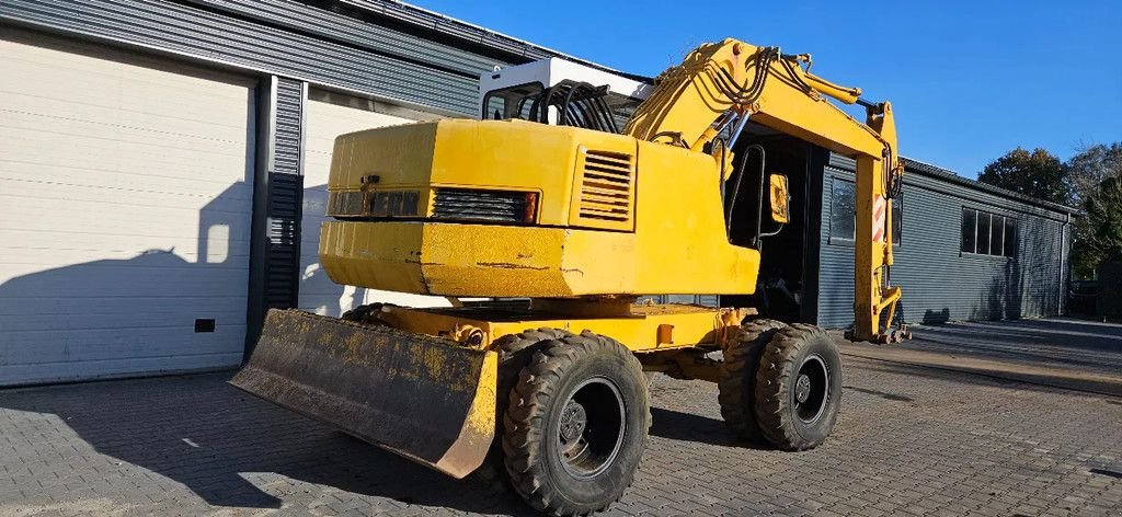 Mobilbagger za tip Liebherr A312, Gebrauchtmaschine u Scharsterbrug (Slika 3)