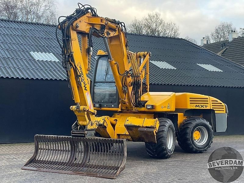 Mobilbagger des Typs Mecalac 14MXT, Gebrauchtmaschine in Vriezenveen (Bild 2)