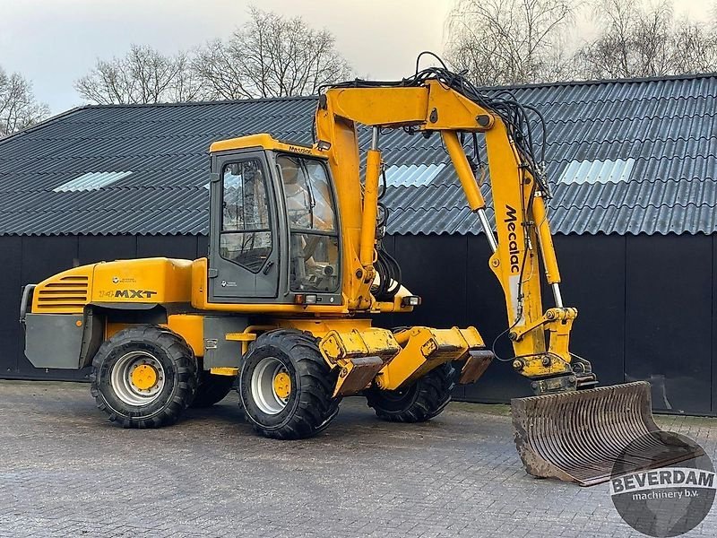 Mobilbagger van het type Mecalac 14MXT, Gebrauchtmaschine in Vriezenveen (Foto 1)