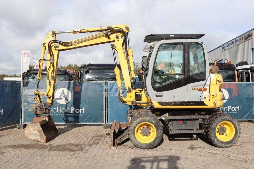 Mobilbagger van het type New Holland MH 2.6, Gebrauchtmaschine in Antwerpen (Foto 2)