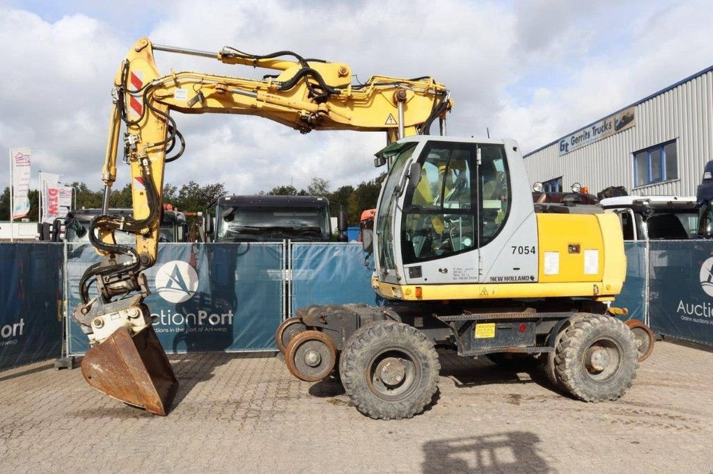 Mobilbagger of the type New Holland MH Plus, Gebrauchtmaschine in Antwerpen (Picture 1)