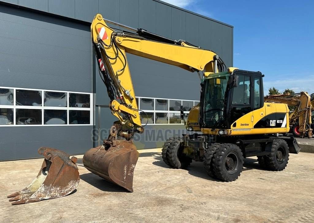 Mobilbagger van het type Sonstige Cat M 313 D, Gebrauchtmaschine in Wommels (Foto 2)