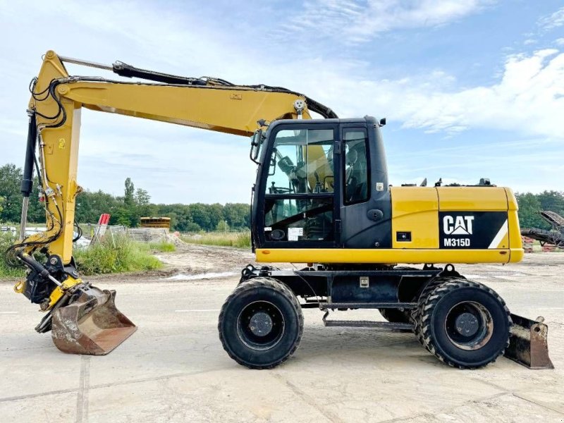 Mobilbagger van het type Sonstige Cat M315D - 360&deg; Engcon Rotating Bucket + Grapple, Gebrauchtmaschine in Veldhoven (Foto 1)