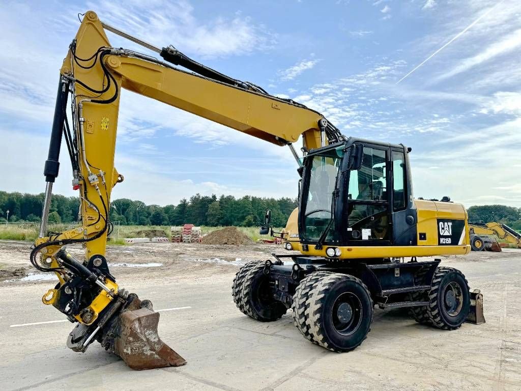 Mobilbagger Türe ait Sonstige Cat M315D - 360&deg; Engcon Rotating Bucket + Grapple, Gebrauchtmaschine içinde Veldhoven (resim 2)