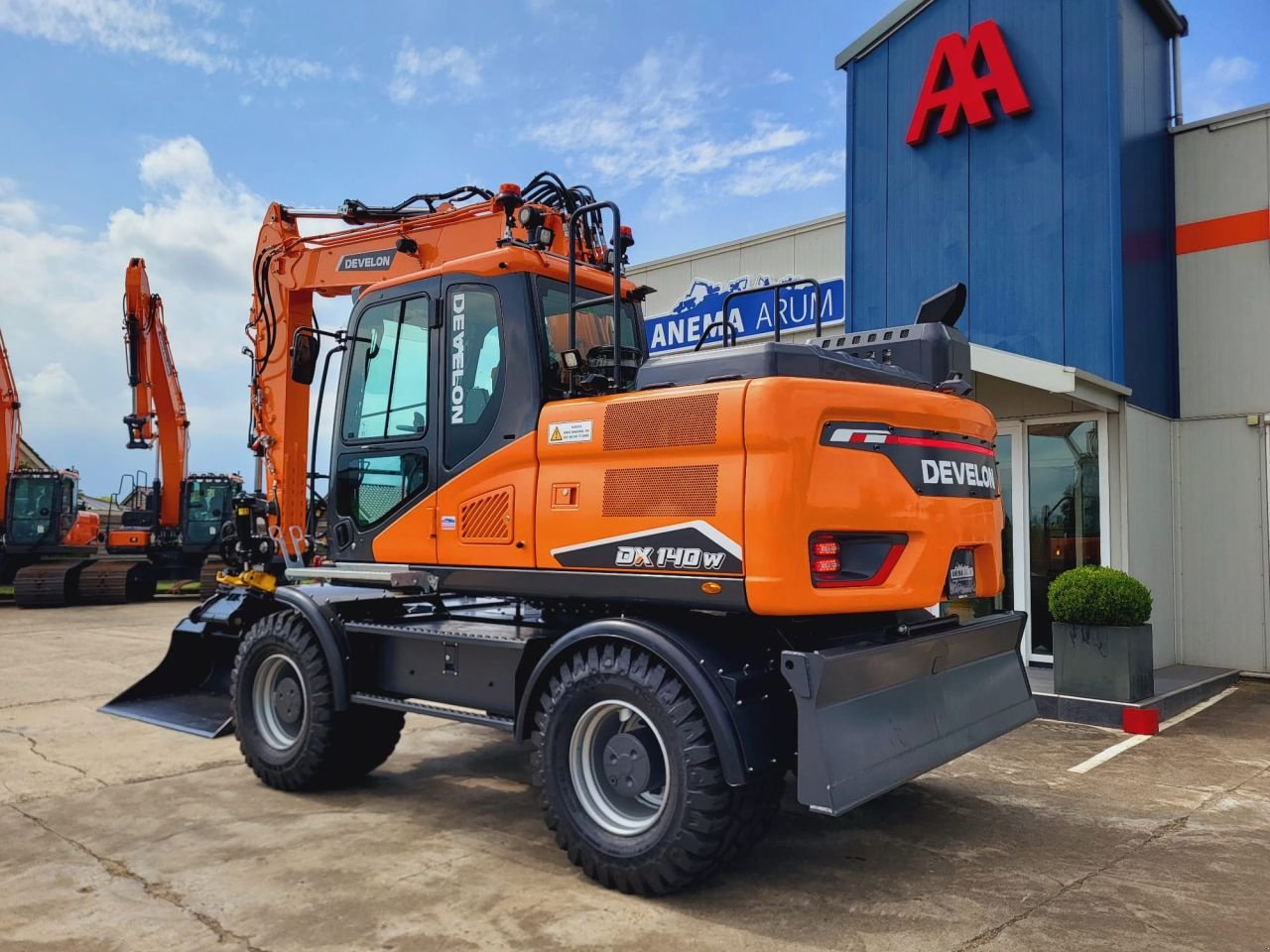 Mobilbagger van het type Sonstige Develon DX140W-7, Neumaschine in Arum (Foto 2)