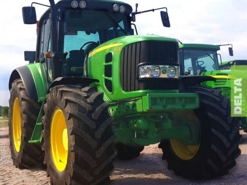 Oldtimer-Traktor van het type John Deere 6930, Neumaschine in Путрівка (Foto 1)