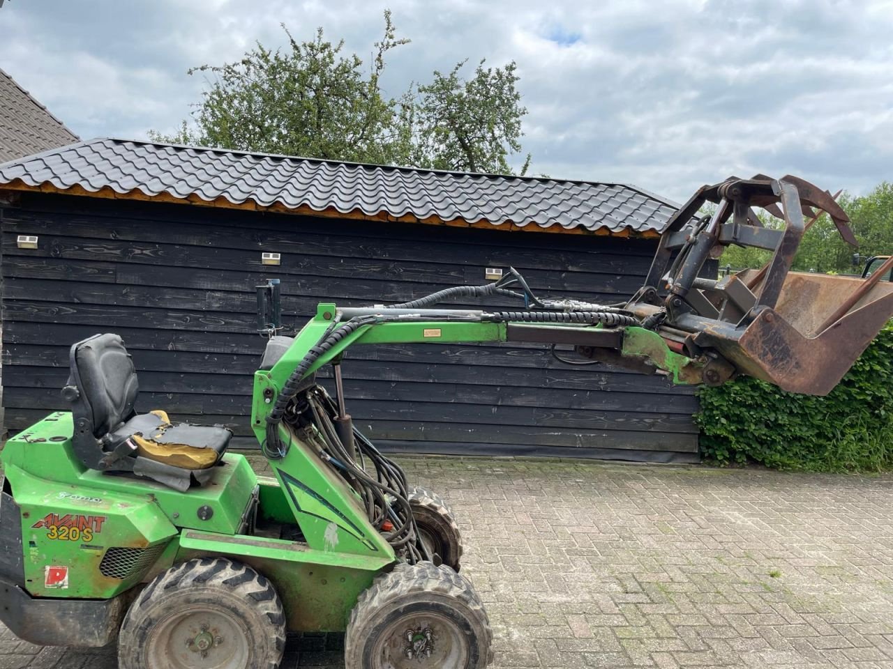 Radlader van het type Avant m320, Gebrauchtmaschine in Udenhout (Foto 10)