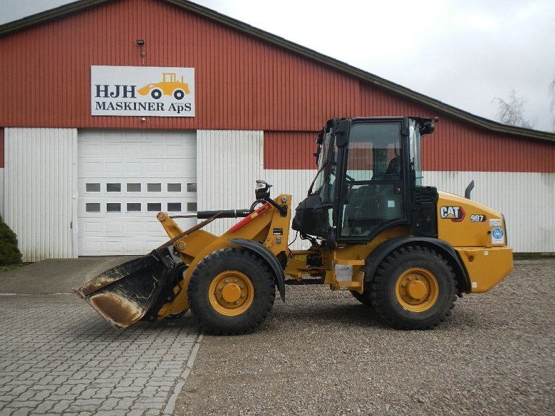 Radlader tipa CAT 907, Gebrauchtmaschine u Aabenraa (Slika 1)