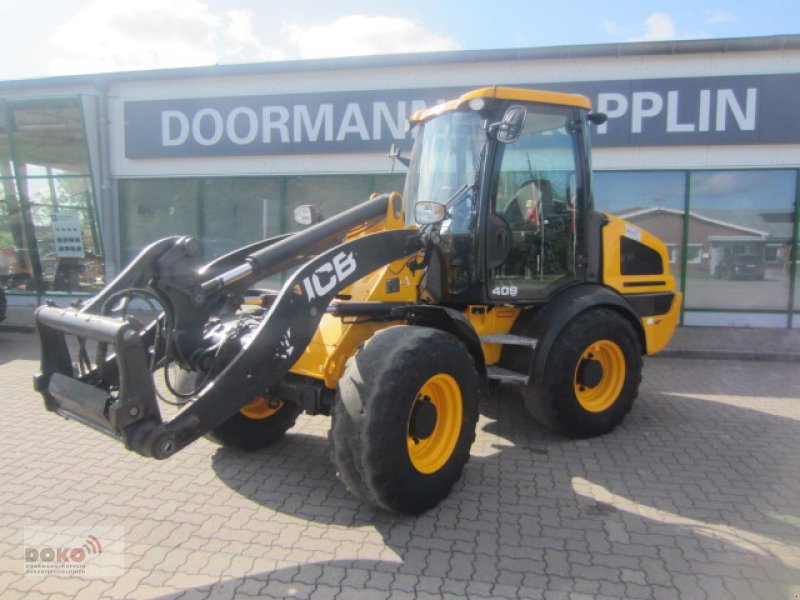 Radlader des Typs JCB 409 AG T4, Gebrauchtmaschine in Schoenberg