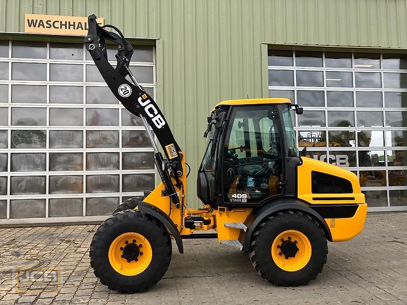 Radlader typu JCB 409 Kompaktlader, Gebrauchtmaschine w Frechen (Zdjęcie 1)