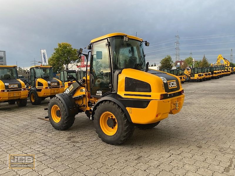 Radlader typu JCB 409 Kompaktlader, Gebrauchtmaschine w Frechen (Zdjęcie 4)