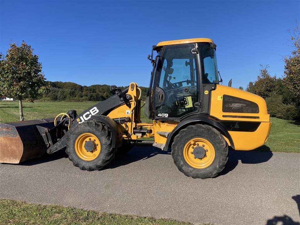 Radlader du type JCB 409, Gebrauchtmaschine en Horsens (Photo 1)