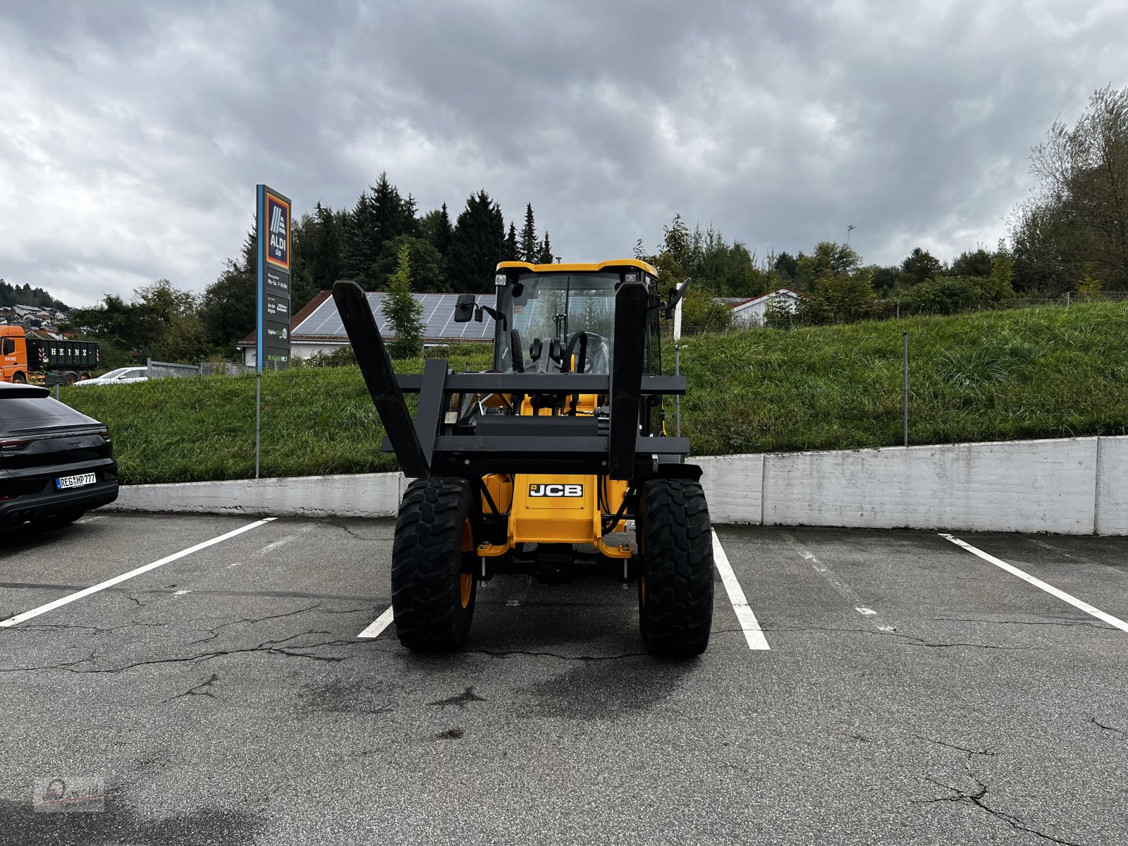 Radlader tip JCB 409, Neumaschine in Regen (Poză 5)