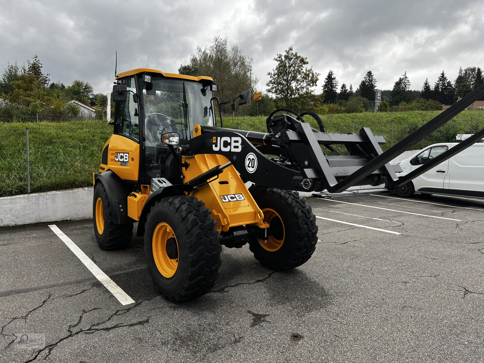 Radlader tip JCB 409, Neumaschine in Regen (Poză 6)