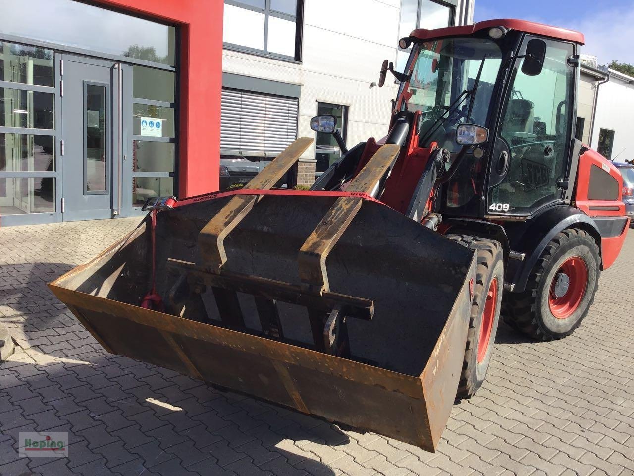 Radlader des Typs JCB 409, Mietmaschine in Bakum (Bild 3)