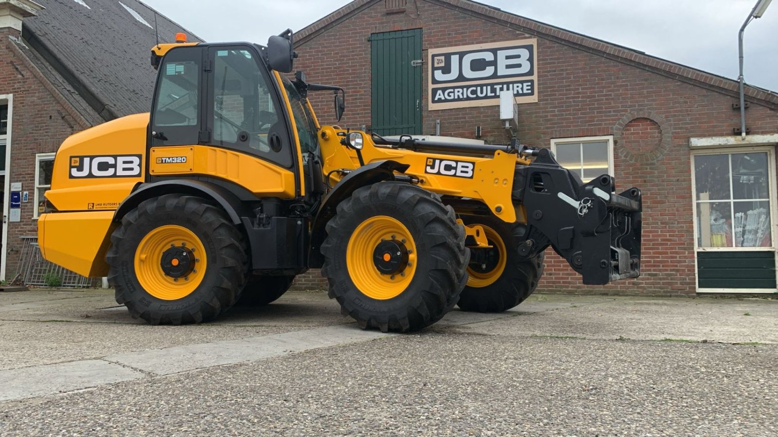 Radlader tip JCB TM 320, Gebrauchtmaschine in Bedum (Poză 1)