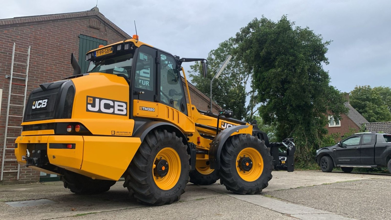 Radlader des Typs JCB TM 320, Gebrauchtmaschine in Bedum (Bild 2)