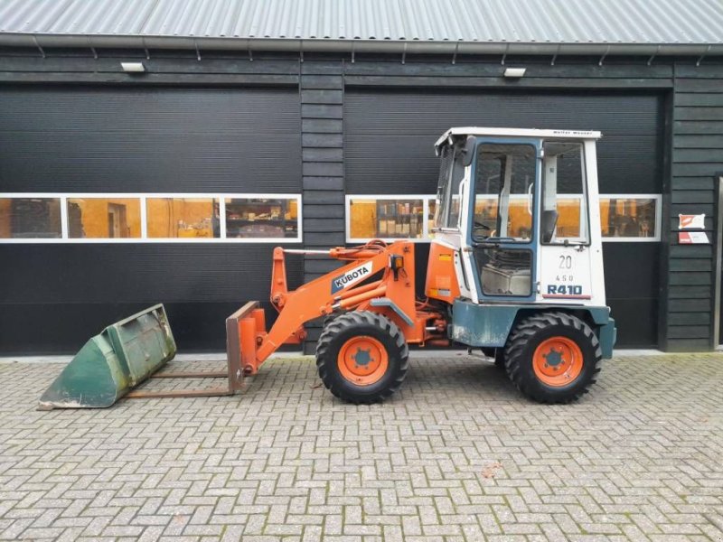 Radlader типа Kubota R 410 midishovel met bak en vorken, Gebrauchtmaschine в Ederveen