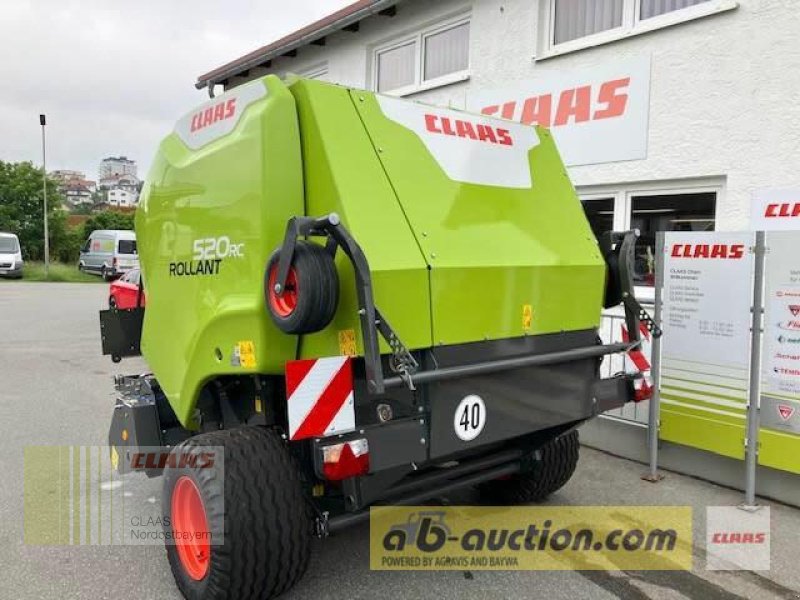 Rundballenpresse des Typs CLAAS ROLLANT 520 RC AB-AUCTION, Neumaschine in Hof (Bild 4)