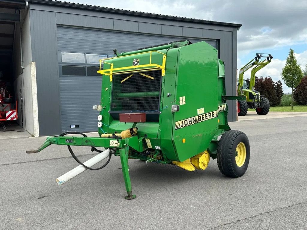 Rundballenpresse tip John Deere 570, Gebrauchtmaschine in BENNEKOM (Poză 11)