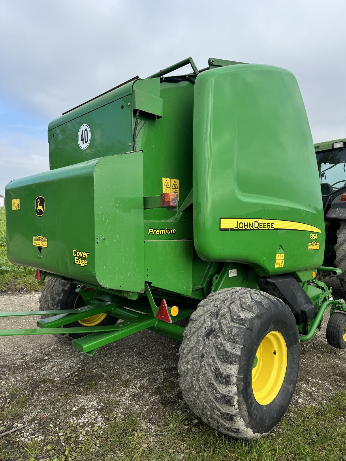 Rundballenpresse des Typs John Deere 854, Gebrauchtmaschine in Pastetten (Bild 3)