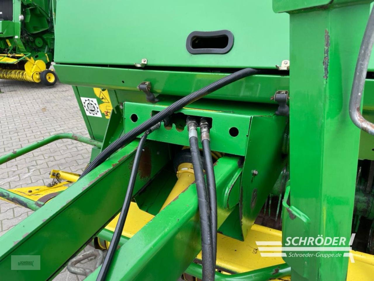 Rundballenwickelgerät van het type John Deere 590, Gebrauchtmaschine in Wildeshausen (Foto 9)