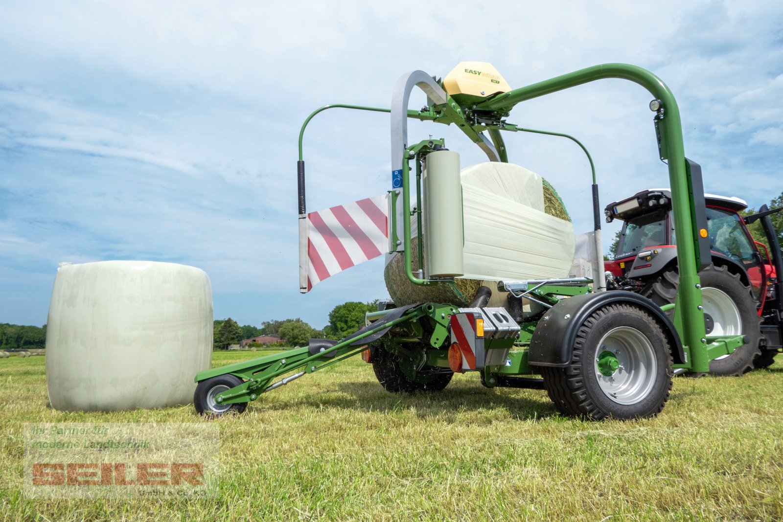 Rundballenwickelgerät du type Krone EasyWrap 165 T, Gebrauchtmaschine en Ansbach (Photo 1)