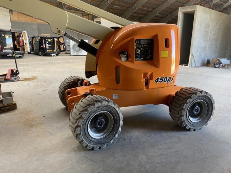 Scherenarbeitsbühne du type JLG 450AJ, Gebrauchtmaschine en Skive (Photo 1)