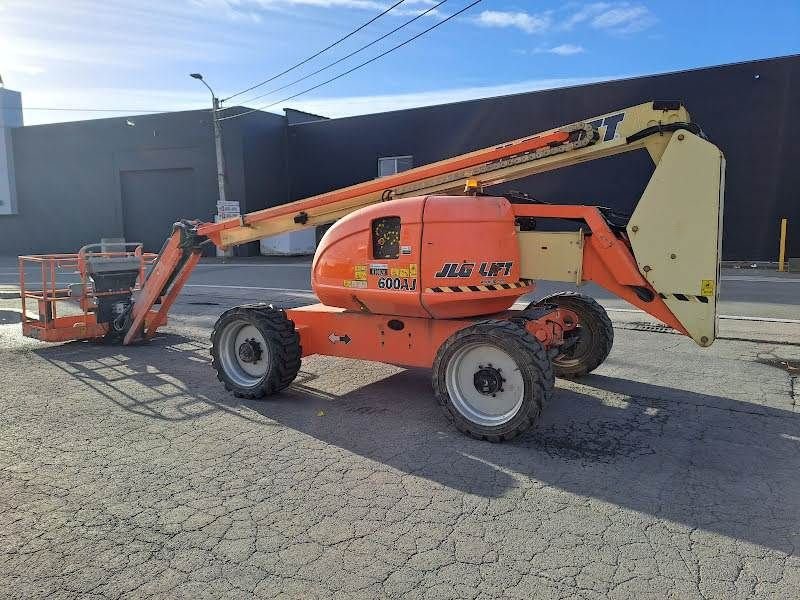 Teleskoparbeitsbühne du type JLG 600AJ, Gebrauchtmaschine en Waregem (Photo 1)