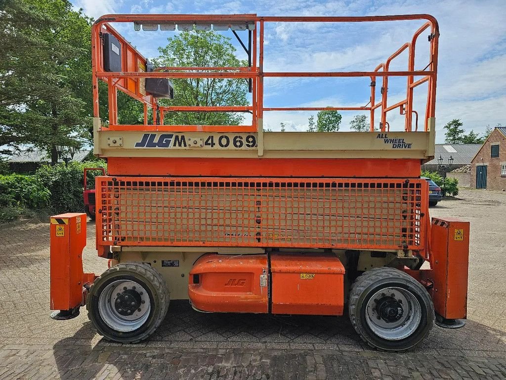 Teleskoparbeitsbühne du type JLG 675 uur 14 m schaarlift hoogwerker bi energie 4 wd, Gebrauchtmaschine en Scherpenzeel (Photo 1)